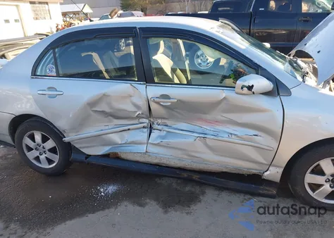 2005 Toyota Corolla Le z USA, uszkodzony, nr VIN 2T1BR30E85C338898